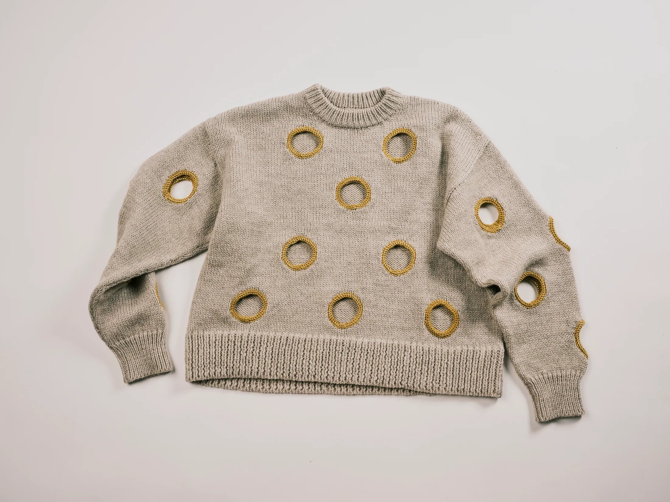 HOLES SWEATER